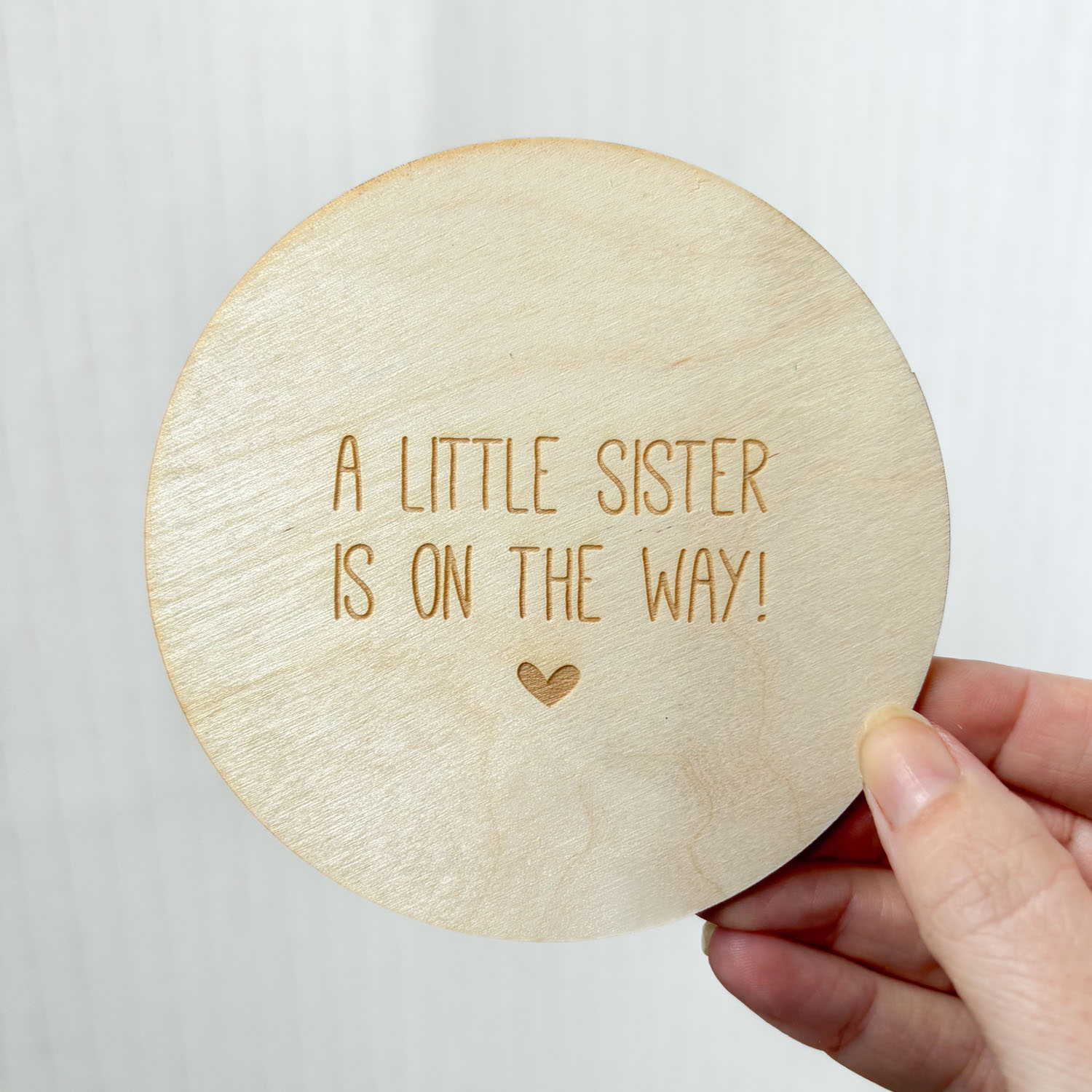 A little sister is on the way - wooden disc